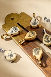 Scratch the Surface Scrimshaw Charm