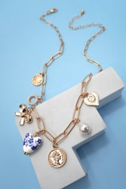 THE ANTIQUE CHARM NECKLACE IN GOLD