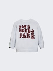 Love Needs Care Crewneck Sweatshirt Light Blue