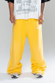 ICONIC BAGGY SWEATPANTS - YELLOW
