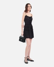 Short black dress with bows