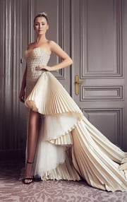 Strapless fully beaded pleated train gown