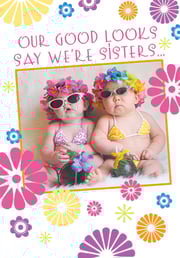 Our good looks say we're sisters...