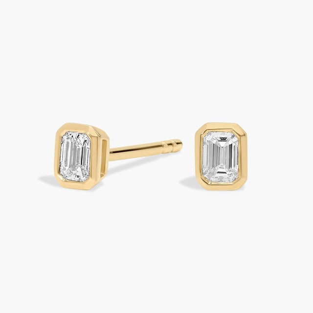 Bezel Set Emerald Cut Lab-Grown Diamond Stud Earrings In 14K Yellow Gold (1/4 Ct. tw. - F-G / VS2-SI1)