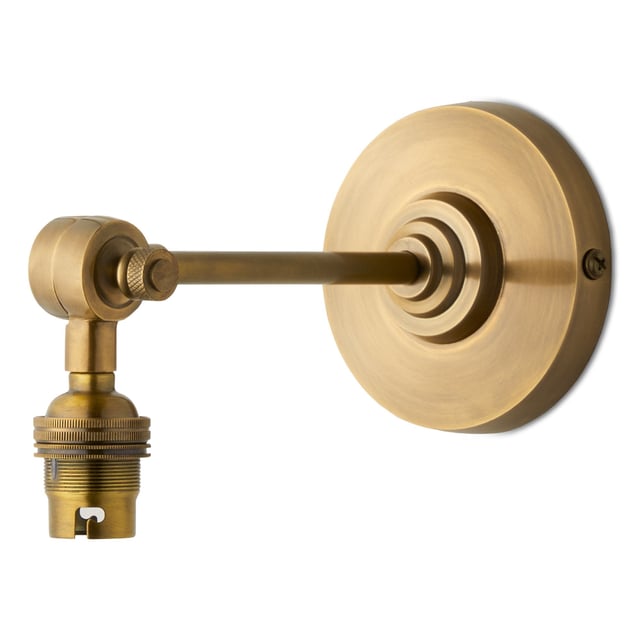 Elbow wall fitting in antiqued brass