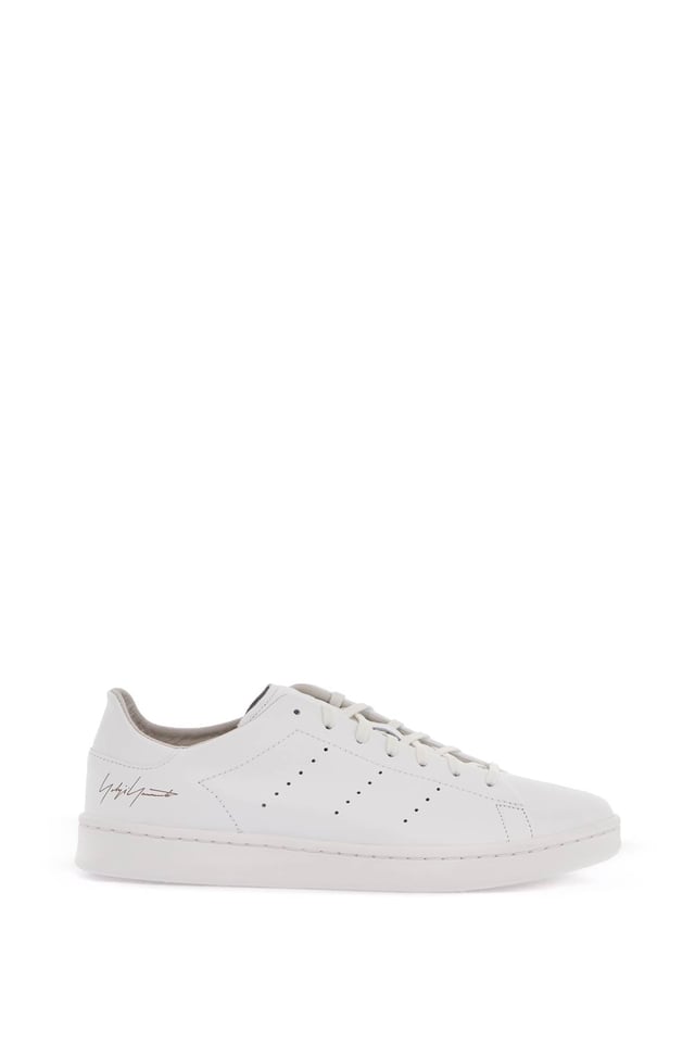 white leather sneakers with minimalist design