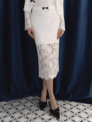 Lace midi skirt with contrasting bow