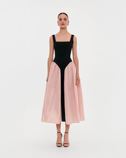 Black corset dress on straps with a glossy pink midi skirt