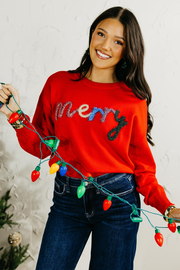 The Merry Tinsel Graphic Sweater