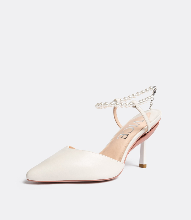 Publicist Pumps in White Pearl