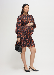 The RSVP Smocked Mini Maternity Dress