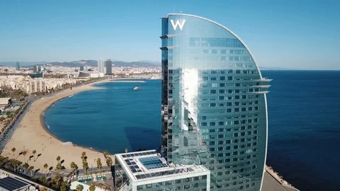 Barcelona Spain - Barceloneta Beach, W Hotel Drone Aerial City Travel Footage 4k