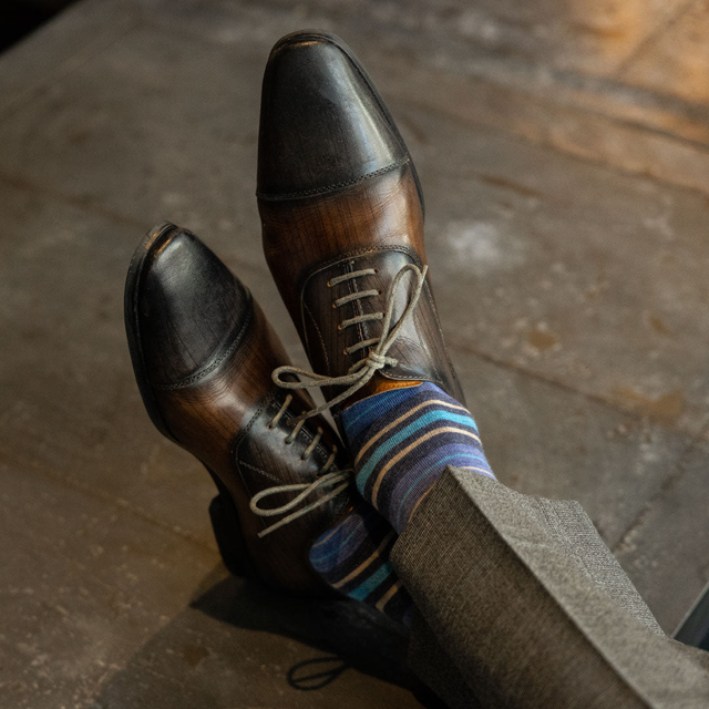 The Harolds - A Blue and Tan Striped Sock