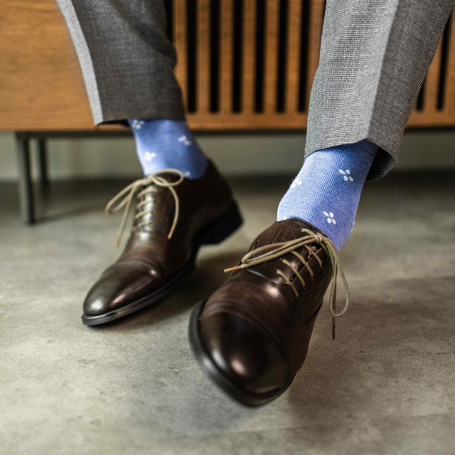 Heathered Blue & Pale Blue Flowers - A Heathered Blue sock with Pale Blue Flowers