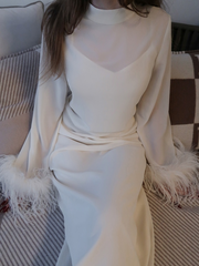 Straight midi dress with feathers on the cuffs