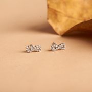 1/10 Carat Infinity Diamond Stud Earrings in Sterling Silver